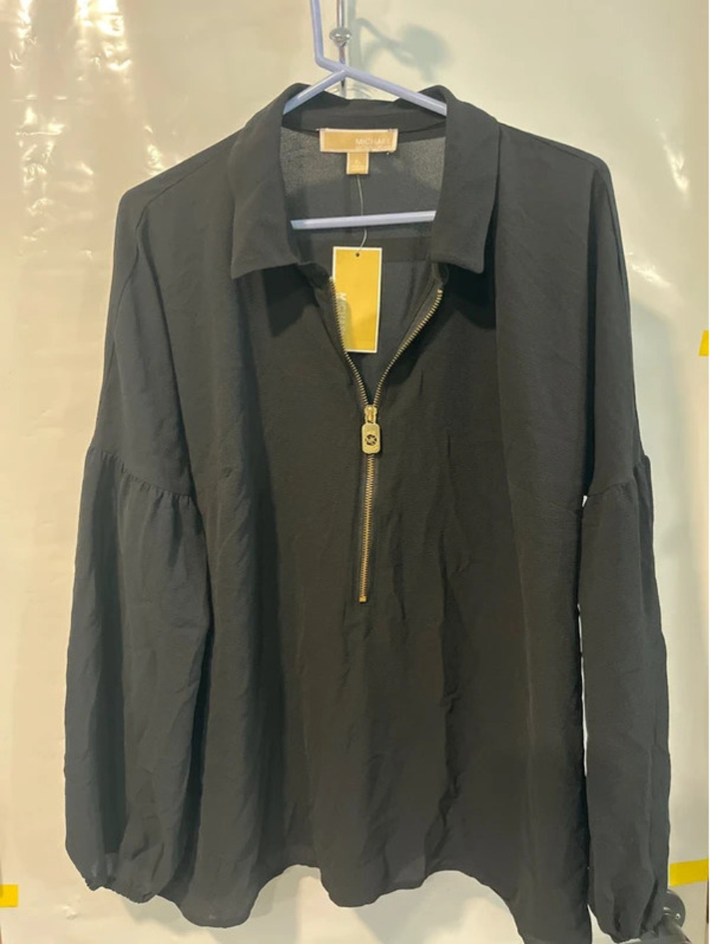 Woman’s XL black blouse with a zipper